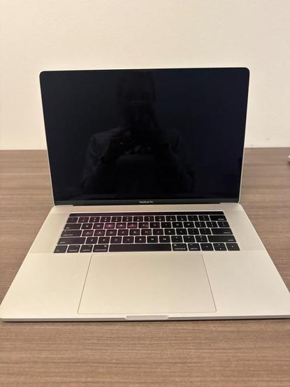 Lot # 119 - Apple MacBook Pro 15” w/ Touch Bar + Charger
