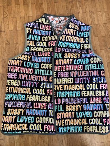 Fully reversible with cheerful, affirming fabric