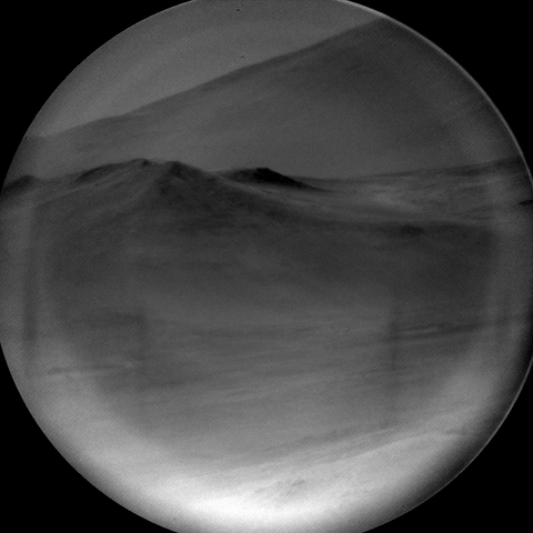 A grey scale image capturing a Martian landscape.