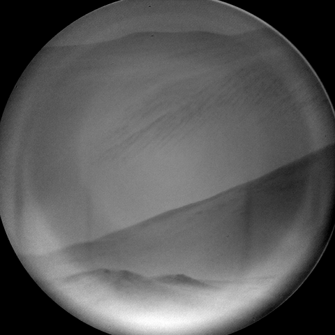 A grey scale image capturing a Martian landscape.