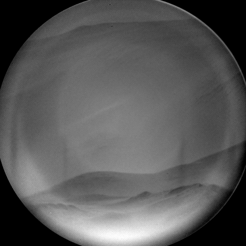 A grey scale image capturing a Martian landscape.