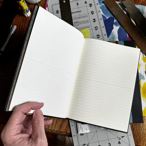 Lined interior of a hand made book. 