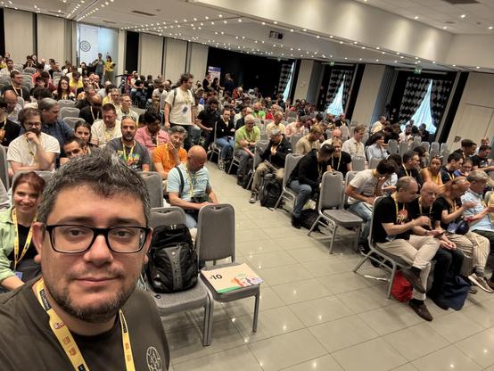 me with an almost full room at Pycon Italy keynote