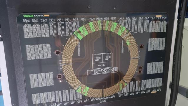 PCB with round array of hundreds of contacts and silkscreen labels