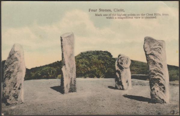 A vintage colour postcard of the Four Stones on the Clent Hills near Stourbridge in Worcestershire. The stones, although they look quite authentic, are actually a relatively modern folly constructed in about 1750 by order of Lord Lyttelton of Hagley Hall. The four tall stones stand in an arc with a green hilltop behind.