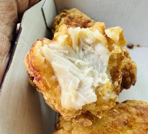 Across section of one of the Nuggets, where you can see the grain of the chicken very moist, not dried out