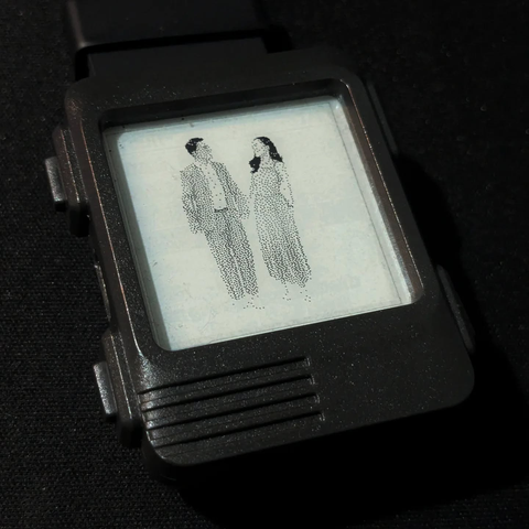 Watchy e-ink watch showing two people looking at each other.