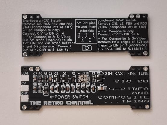Two VIC-20 S-Video and Composite ... thing... These must be soldered on the bottom of the PCB, to connect some of the pins of the VIC chip. One side has all the components, the other side has a detailed description on how to install it, printed on the silk screen.