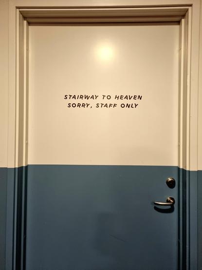A closed door lettered with "Stairway to heaven. Sorry, staff only."