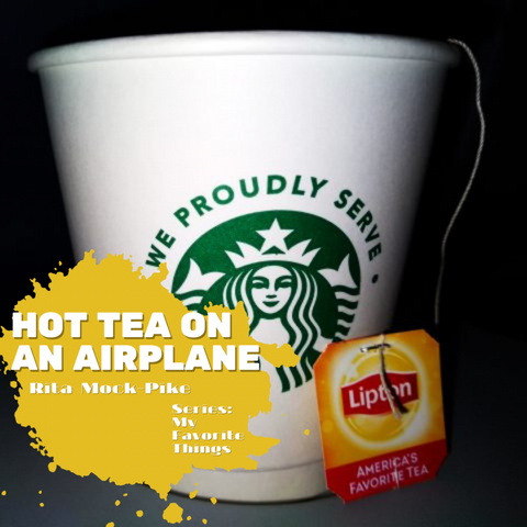 Paper teacup with a Lipton tea bag - TEXT: Hot Tea on an Airplane - Rita Mock-Pike - series: My Favorite Things