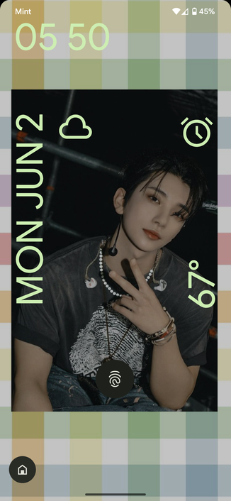 Image shows my new lock screen of Joshua on a colorful plaid background.