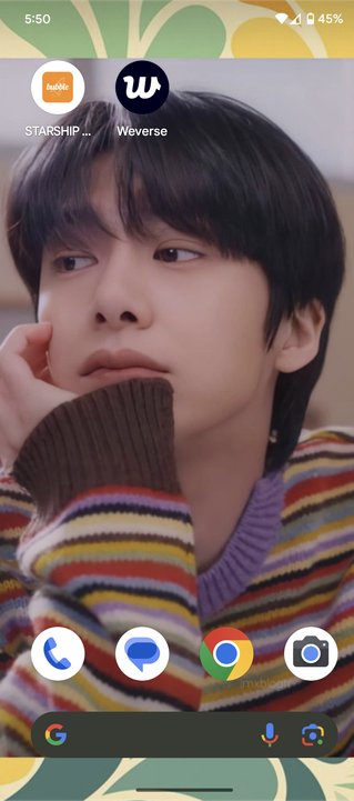 Image shows my new home screen of Hyungwon on a colorful background.
