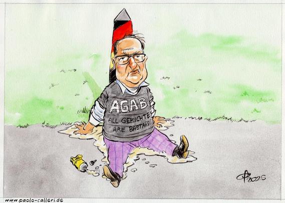 Karikatur. Minister Dobrindt hat sich am Boden neben einem Grenzstein festgeklebt. Er blickt uns an und trägt ein T Shirt mit der Aufschrift AGAB All Gerichte are bastards