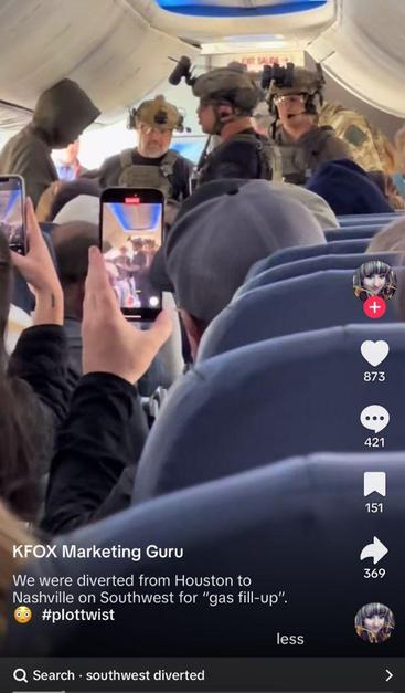 US officers arresting someone on a plane