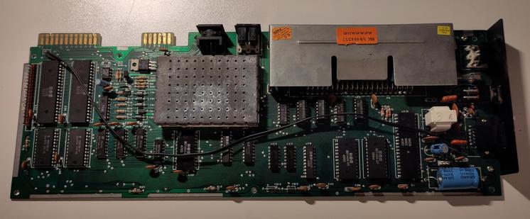 The VIC-20 shortboard laid out on the bench, removed from the case.