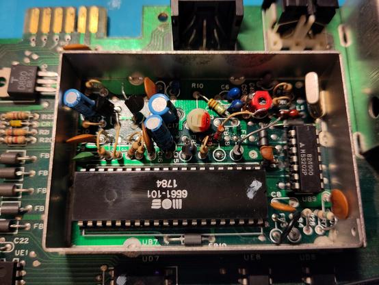 The VIC-20 original video circuitry around the VIC chip, with the modifications already done for the video mod. Some components needs removal, or several legs lifted. This later is what I've done here.