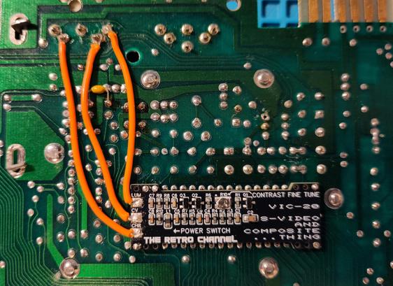 The bottom of the board, with the SVideo and Composite board fitted, and patch wires for the composite and chroma/luma signals installed.