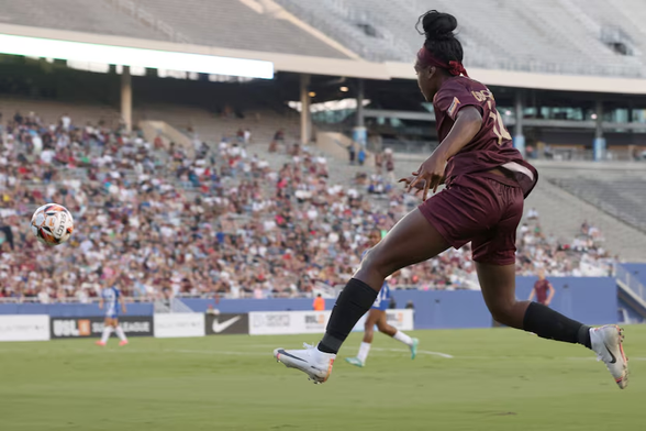 Dallas Trinity FC's Chioma Ubogagu (14) fires a shot on goal during first half play against DC Power FC. Dallas Trinity FC hosted DC Power FC in their season home opener at the Cotton Bowl in Dallas on September 7, 2024. (Steve Hamm / Special Contributor)
