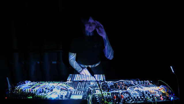  Krista Bourgeois behind her machines.