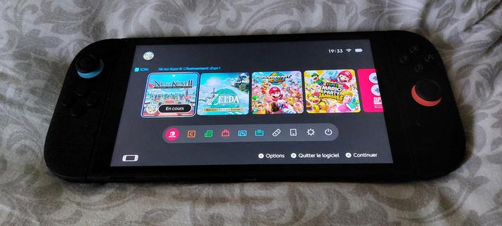 une switch 2 posée sur un oreiller