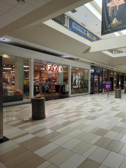 Wide-angle shot of an FYE storefront on the first floor of the mall.