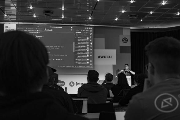 Ryan Welcher during a Workshop on Block Development, pictured here through some of the attendees in front of me.