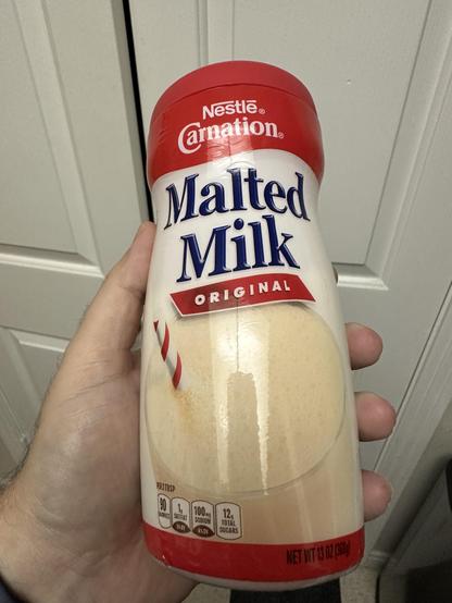 A container of malted milk powder