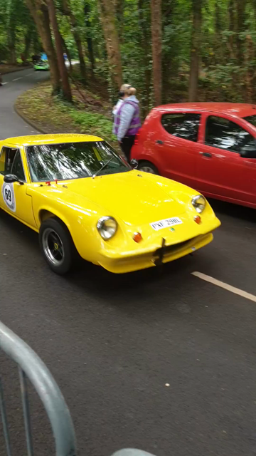 A Lotus Europa, a Mini and a 911 2.7 RS (homage?) on a sighting lap at the Cultra Hill Climb, Northern Ireland.