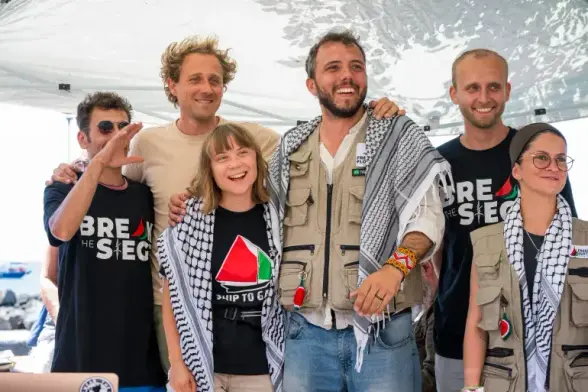 Madleen crew, with Greta Thunberg in the centre.