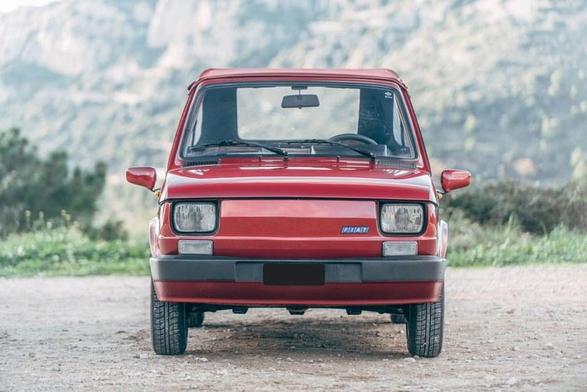 Face-on photo of a Fiat-Polski 126p compact hatchback car