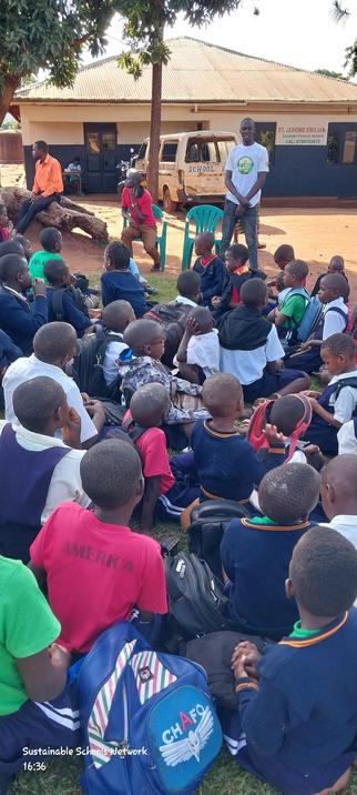Students being taught about Climate Change and Sanitation by the SSN founder (Timo)