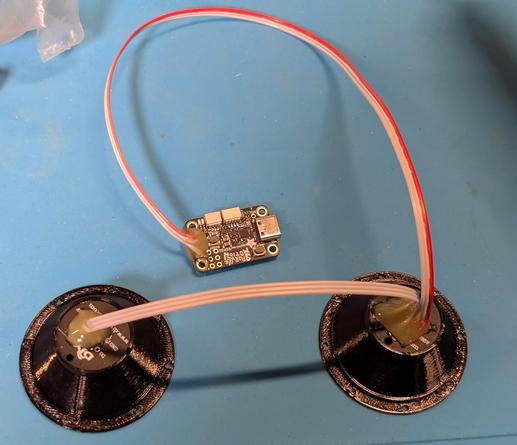 The back-side of the assembly, showing the wires and the circuit board. 