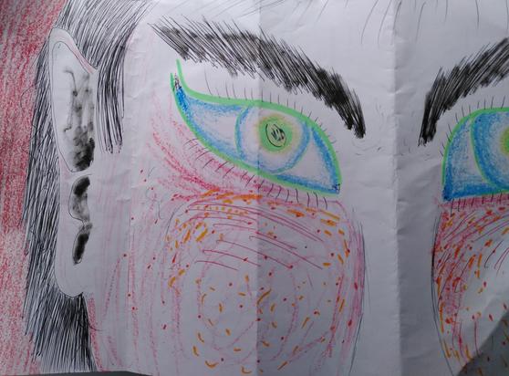 A person with blue eyes.. sign of the spice poisoning on Harrakis among fremen people
