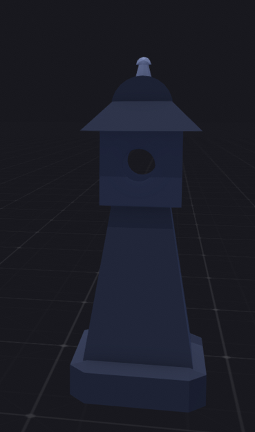 The image depicts a 3D model of a dark blue tower-like structure, resembling a chess piece, possibly a rook. The structure has a solid, blocky appearance with a flat base, a rectangular body, and a domed top with a small, rounded fin. A circular opening is visible on the front face of the tower. The background is a dark grid, suggesting a virtual environment, with the tower centered and slightly off-center to the right. The lighting is minimal, casting subtle shadows and giving the model a matte finish.