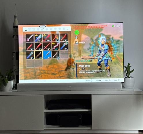 Nintendo Switch 2 under LG OLED C4 TV presenting Zelda TOTK game