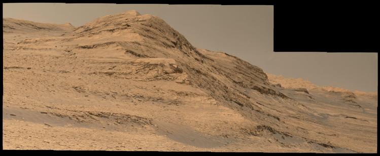An ochre toned mosaic capturing the cliffs, buttes and yardangs south of the rover, looking up the slopes of Aeolis Mons. Captured at around 1 pm local time.
