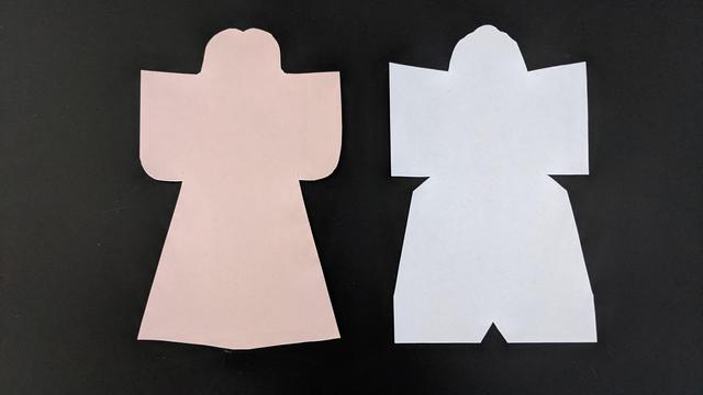 Paper cut into vaguely human shapes have long been used as amulets. It was common to transfer impurities onto the 'dolls' before disposing of them.