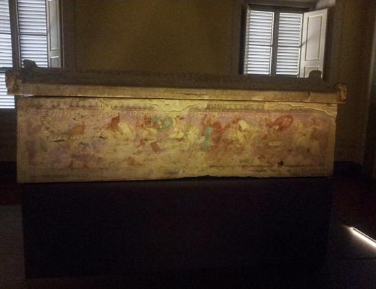 An inscription on the long side of the sarcophagus