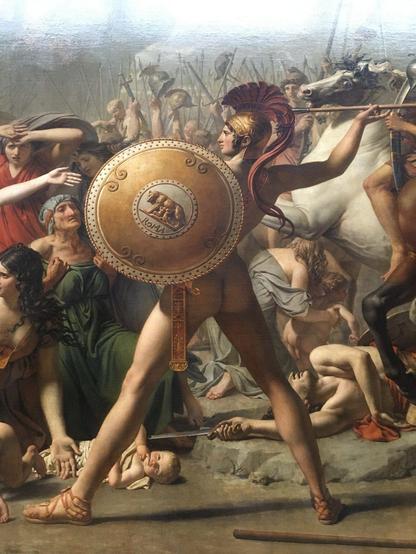 Detail of an oil painting depicting a vigorous Romulus preparing to strike with his spear, but hesitates. His bum is in the shade of his shield but clearly homage to ancient Greek art.