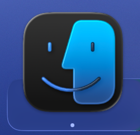 Dark Mode Finder icon in the macOS 26 Beta. The face in profile in the right half of the icon has a lighter color, as it traditionally has.