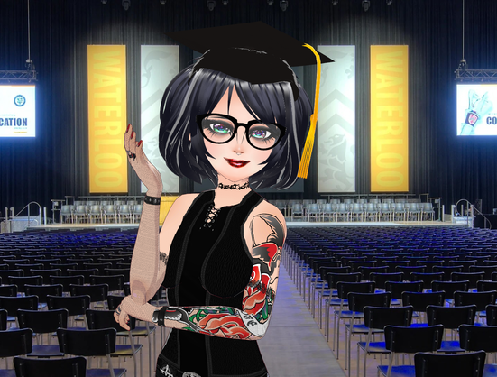 A goth Vtuber in a grad cap in an auditorium.
