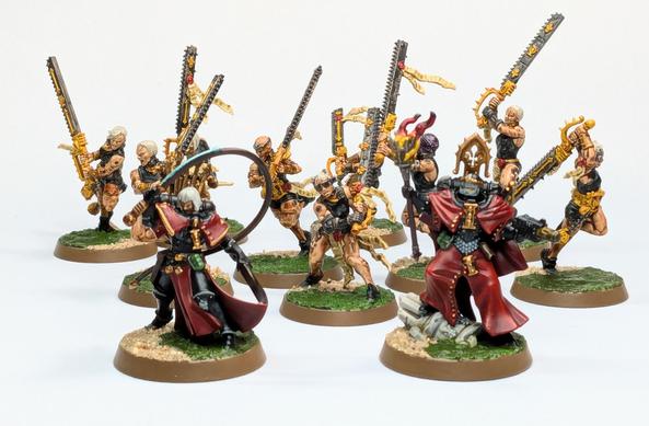Repentia squad and a Canoness painted in the style of the Order of Our Martyred Lady.