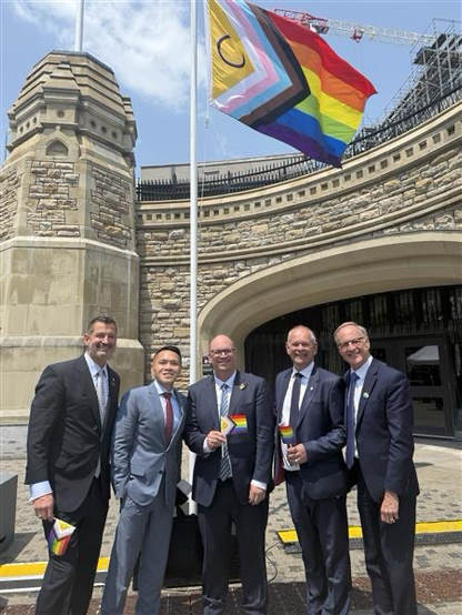 Senators Wells & Wilson. MPs Chang, Klassen, Oliphant on Parliament Hill with Pride flag