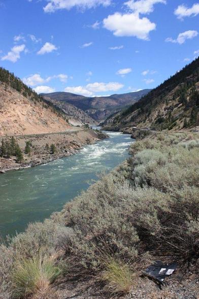 The rapid filled Thompson River runs from Kamloops Lake, around the bend in the distance, to the Fraser River. 