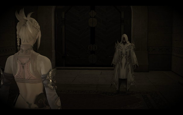  In a dimly lit, stone-walled hall, a woman with blonde hair faces away from the viewer, directly addressing a hooded figure standing near a large, dark wooden door. The hooded figure is clad in a white robe adorned with intricate silver patterns. The scene evokes a sense of tension and mystery.