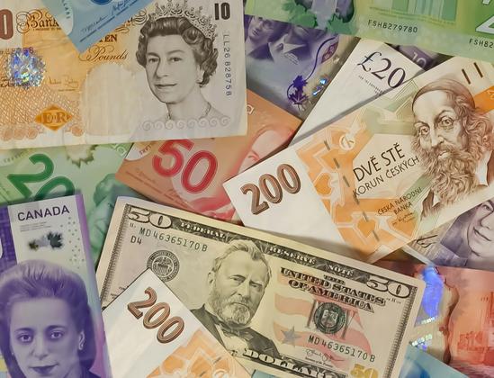 Image of currencies (bank notes) from multiple countries worldwide