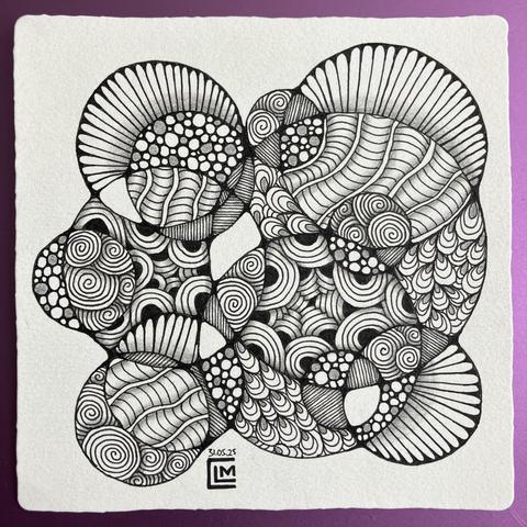 Finished tile with black ink patterns and graphite shading