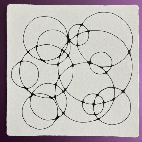 Interlocking circles with smoothed out corners at the overlapping joints