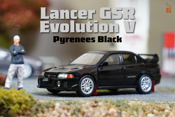 A left side of Mitsubishi Lancer GSR Evolution V 1998 with Mud Flap, Pyrenees Black by Hobby Japan in 1:64 scale with 1:64 figure on AREA 164