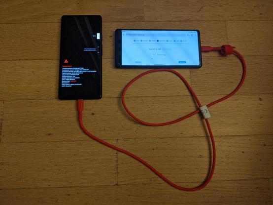 two phones connected with USB cable